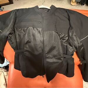 Woman’s Black scorpion exo cargo Jacket - Sleek Protective Design